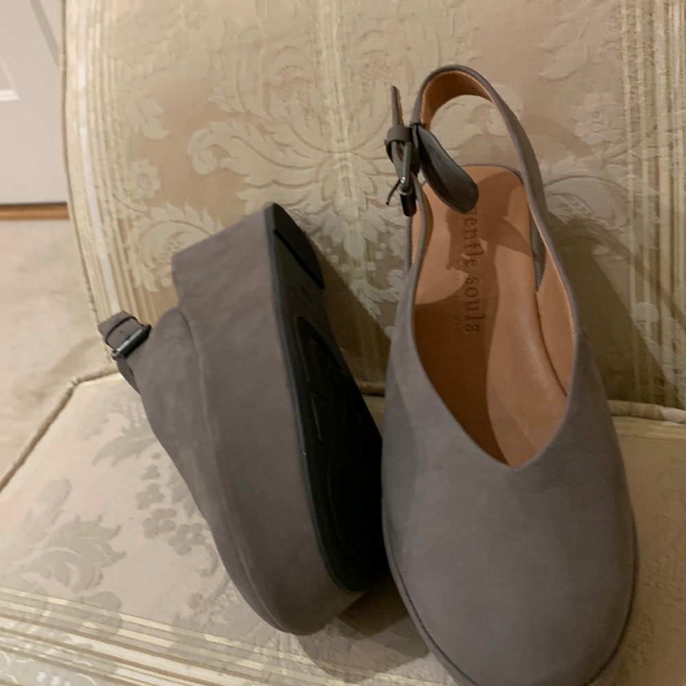 Never worn. Platform measure  1 inch at toes and 1-1/2 inches at heel.